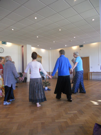 A group of circle dancers